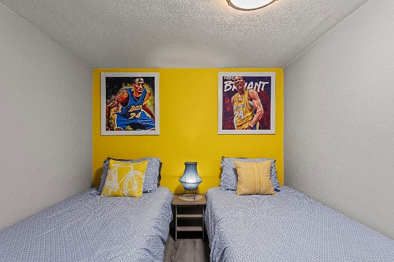 Your Twin Oasis  Unwind in our inviting bedroom, featuring two single beds