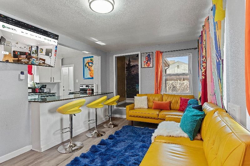 Create cherished memories in our living room, complete with comfy couches