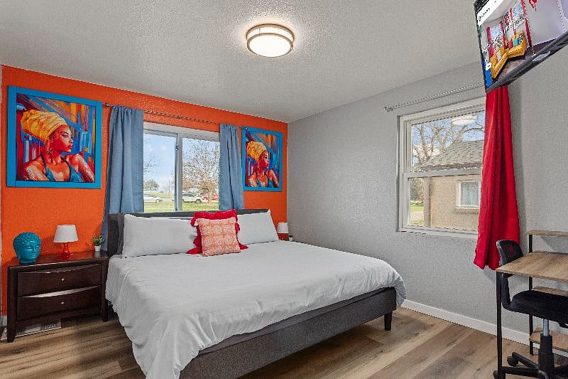 Experience the best of both worlds in our room with a king-sized bed, a desk and chair for work or study, and a smart TV for your leisure.