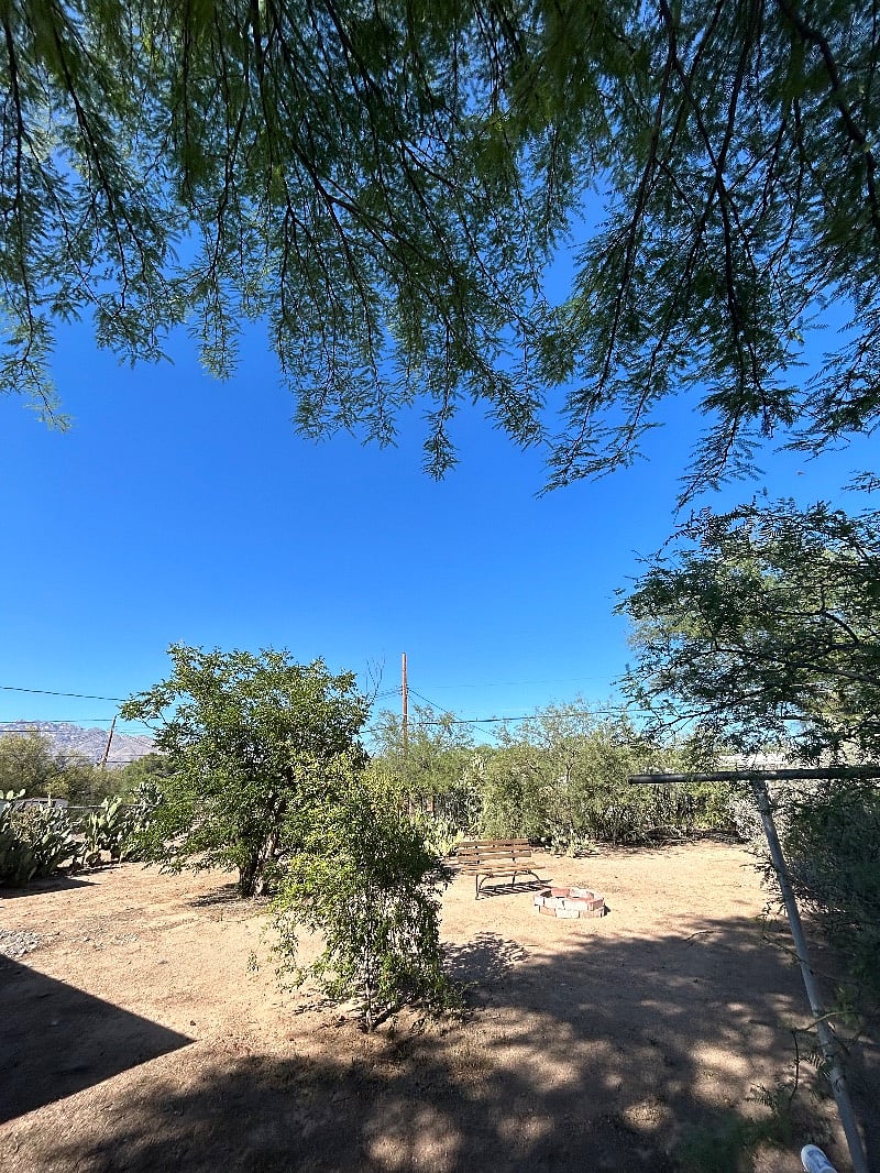 The backyard is fully fenced.