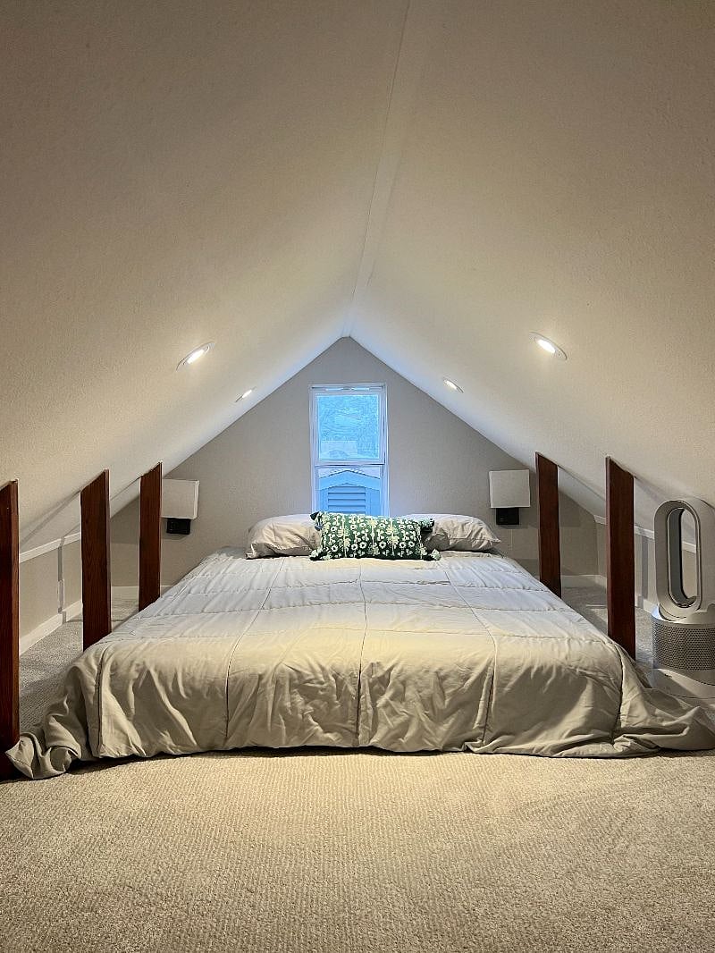 Bedroom loft accessible by attic stairs