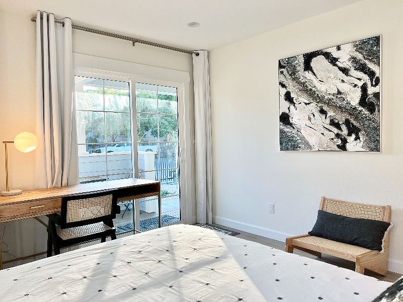 Master bedroom with sliding door to the porch