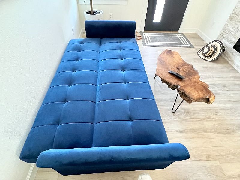 livingroom sofa can be flattened to a single bed