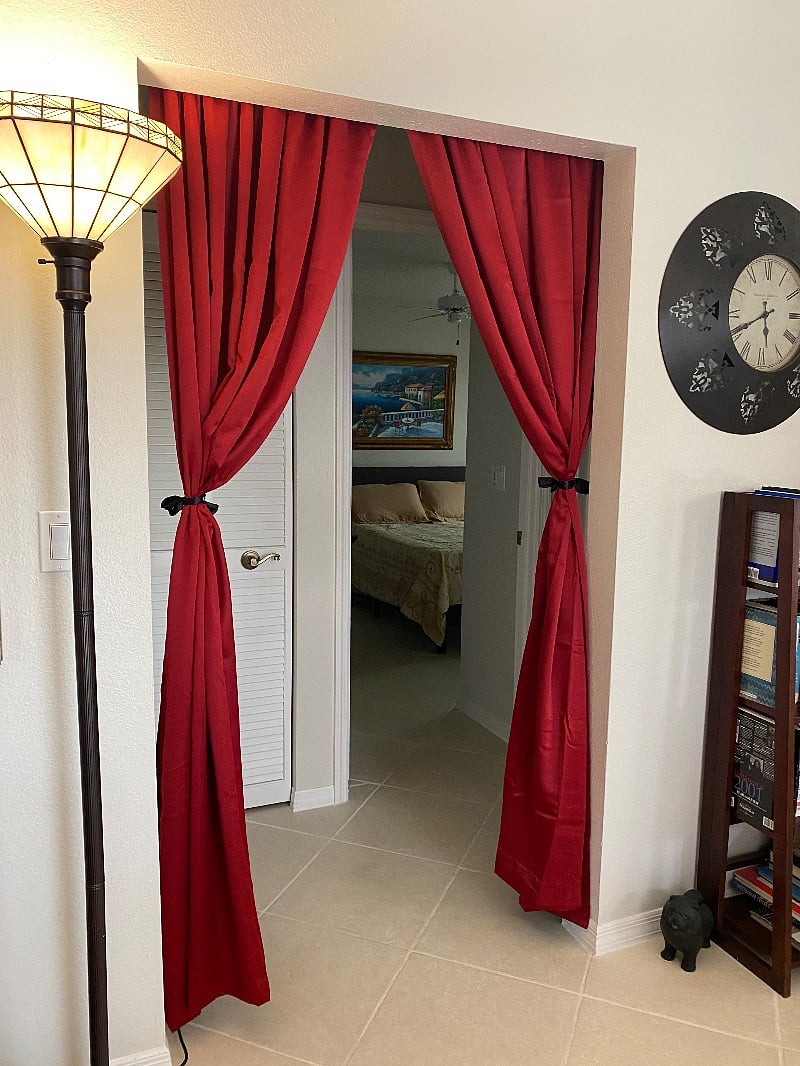View from family room to Queen bedroom with privacy curtains