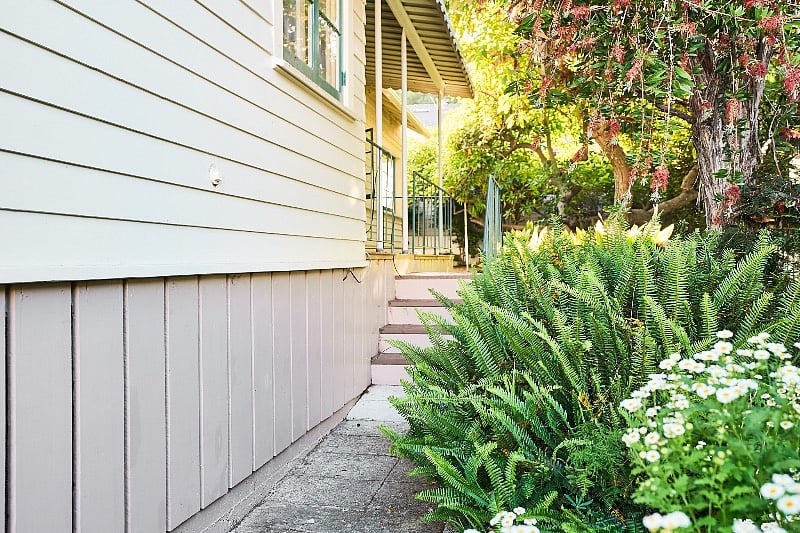 Quiet garden setting, looking towards apartment entry.