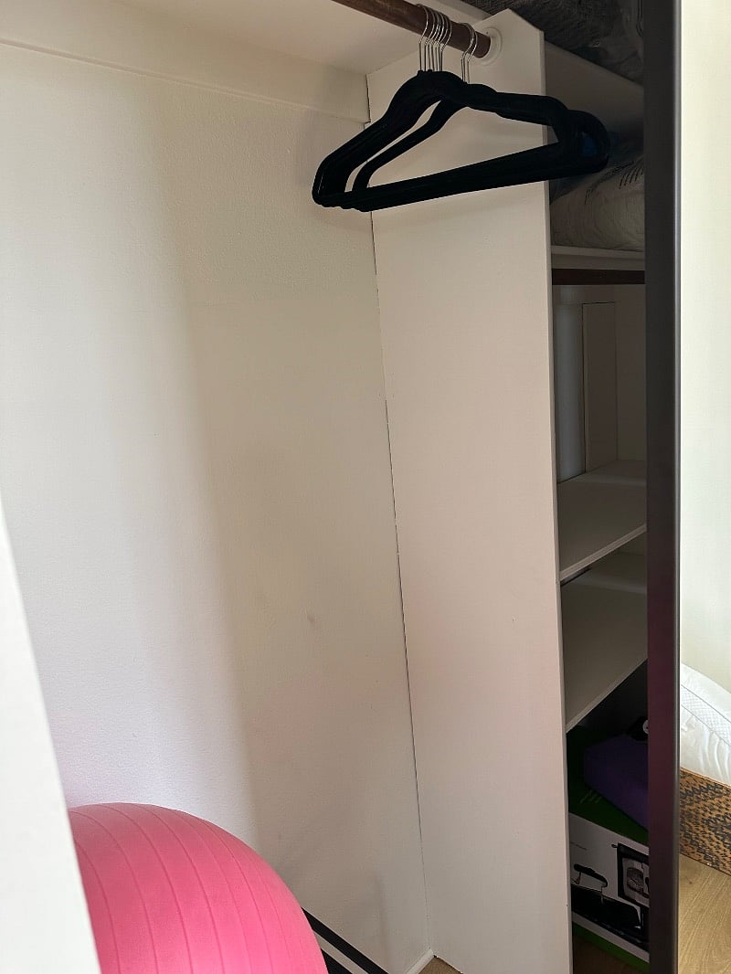 Closet with room for hanging or folded
Clothes