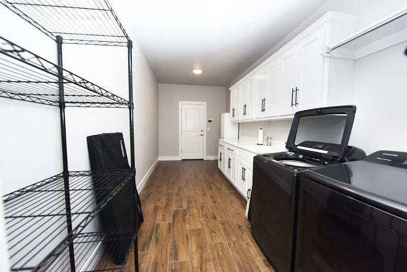 MASSIVE Laundry Room With Lots of Storage. Pre-Stocked with Paper Products and All Cleaning Supplies