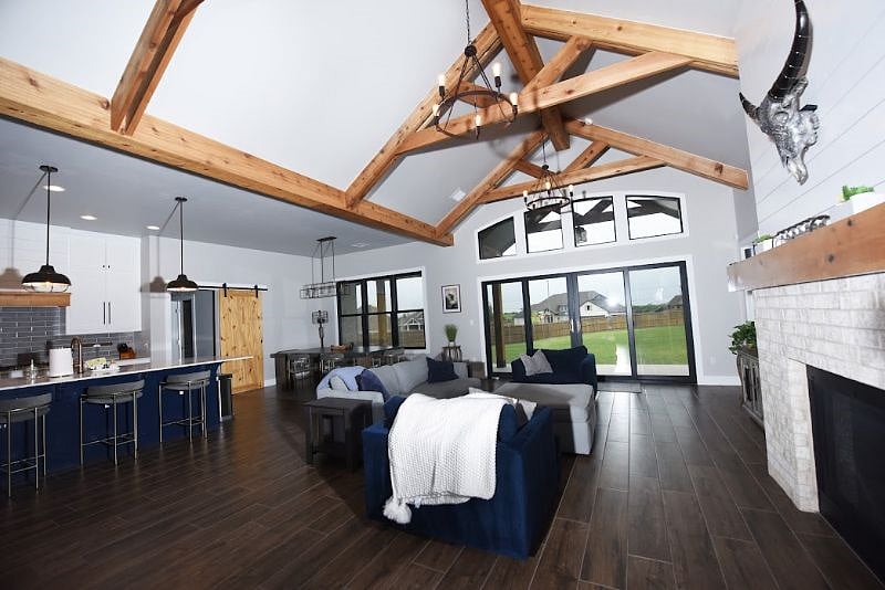 Vaulted Ceiling Living Room with Gas Fireplace and Natural Light