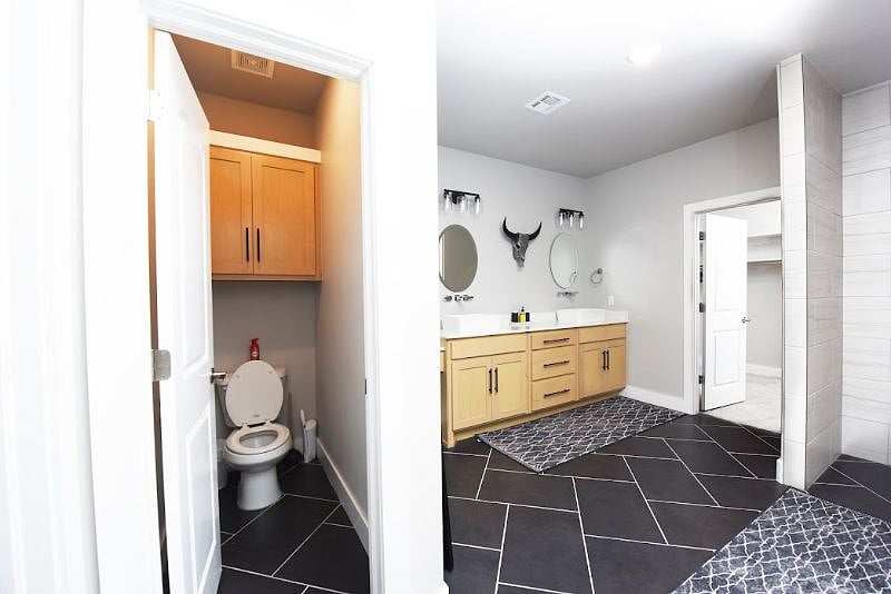 Master Bathroom Double Vanity With Cosmetic Station and Separate Water Closet