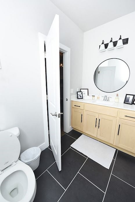 Powder Bath Next To Entry So Your Guests Don't Have to Use Any of the Room Bathrooms