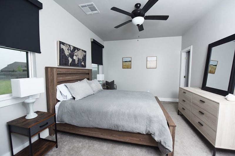 Queen Suite One. Plenty of Natural Light, Walk-In Closet, and Ceiling Fan