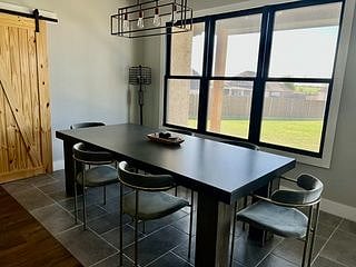 Large Dining Table Can Seat Up to 8. Lots of Natural Light!
