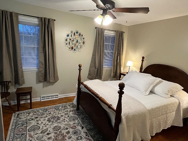 Bedroom #2 with double/full bed and sitting area.