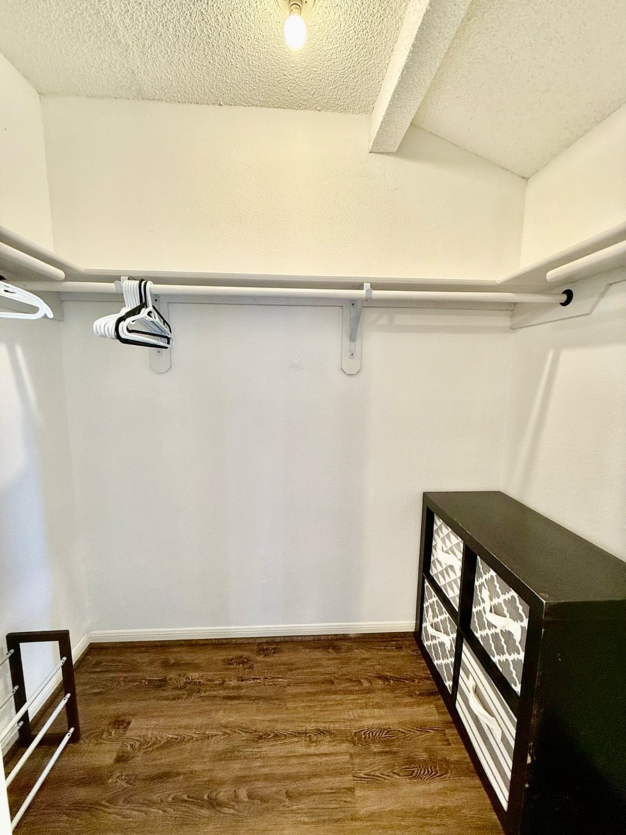 Walk-in closet in master bedroom