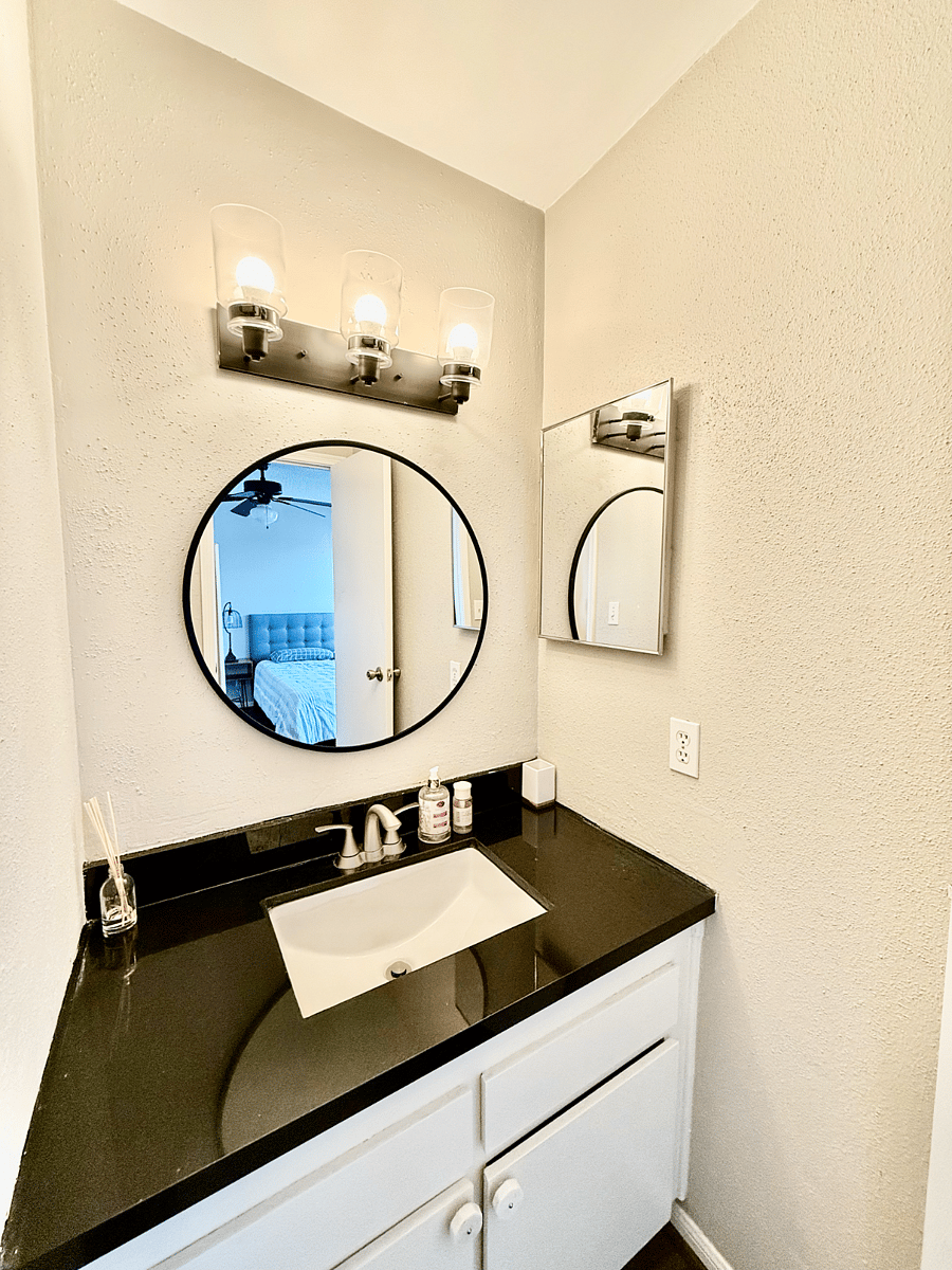 Sink vanity from secondary bedroom