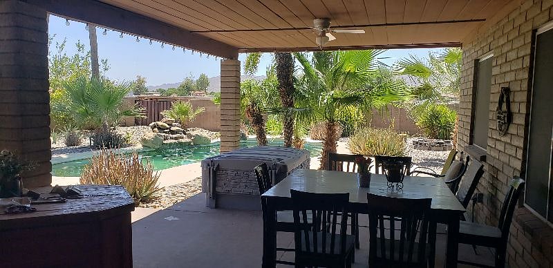 Common area in back yard for your pets with pool and hot tub and view of mountains and horses... several BBQs to choose from.. shared with main house..