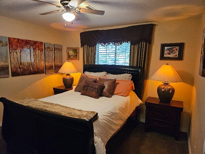 Main home queen sized bedroom #5 mini frig, private bath, rents for $1400/mo.