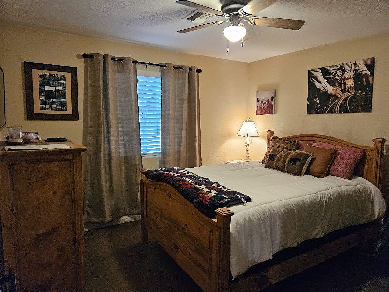 Main home queen bedroom # 6 with shared full bathroom off kitchen! Rents for $1400/mo.