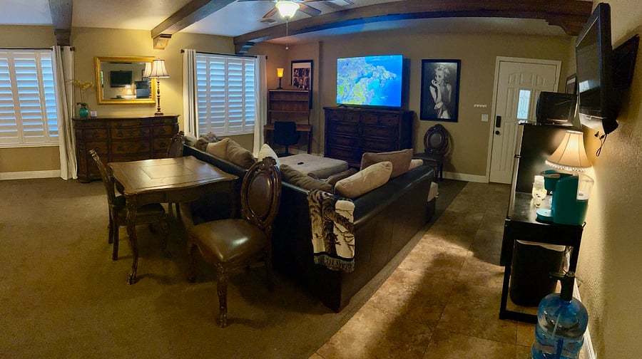 Casita livingroom within the king sized bedroom #1.. private entrance /exit to carport, with mini frig, microwave, coffee and office desk. 