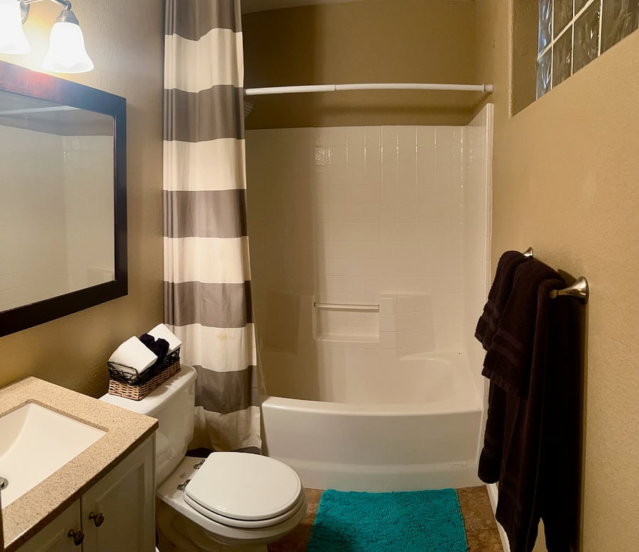Casita private bath in queen sized bedroom #3, view to pool area.. 