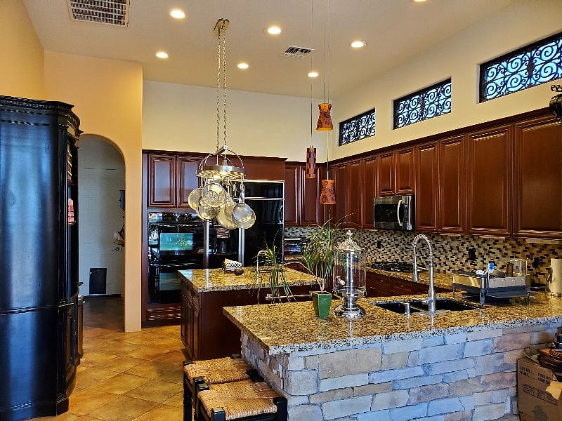 Kitchen w/Private Refrigerator,  pantry storage space, ovens, microwave, dishwasher, all appliances etc. 