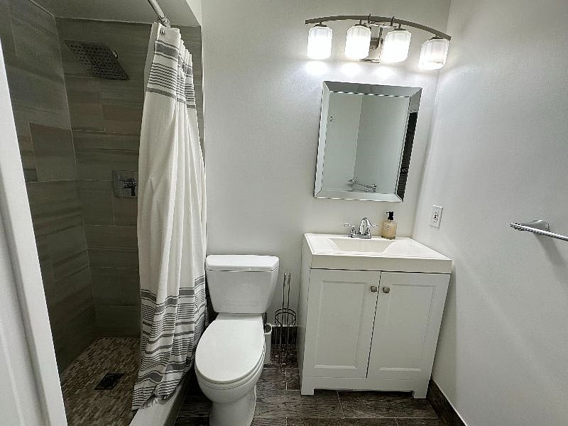 Bedroom 1  Ensuite, Smart TV, Balcony, and Walk-In Closet