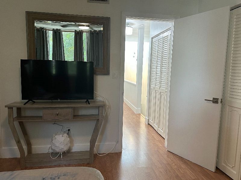 Bedroom 2  Ensuite, Smart TV, and Spacious Closet