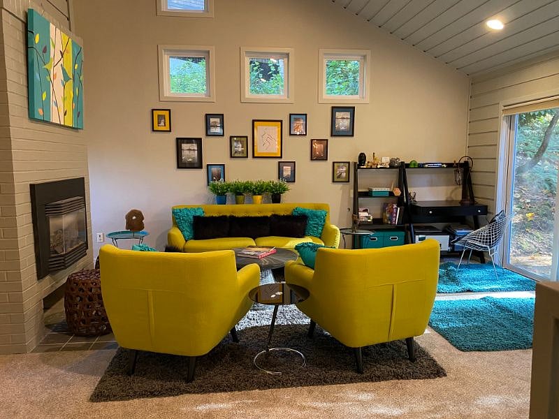 The living room with a fireplace.