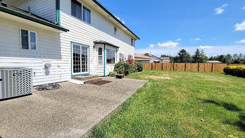 Backyard view from sliding doors - outdoor furniture will be added at a later point.