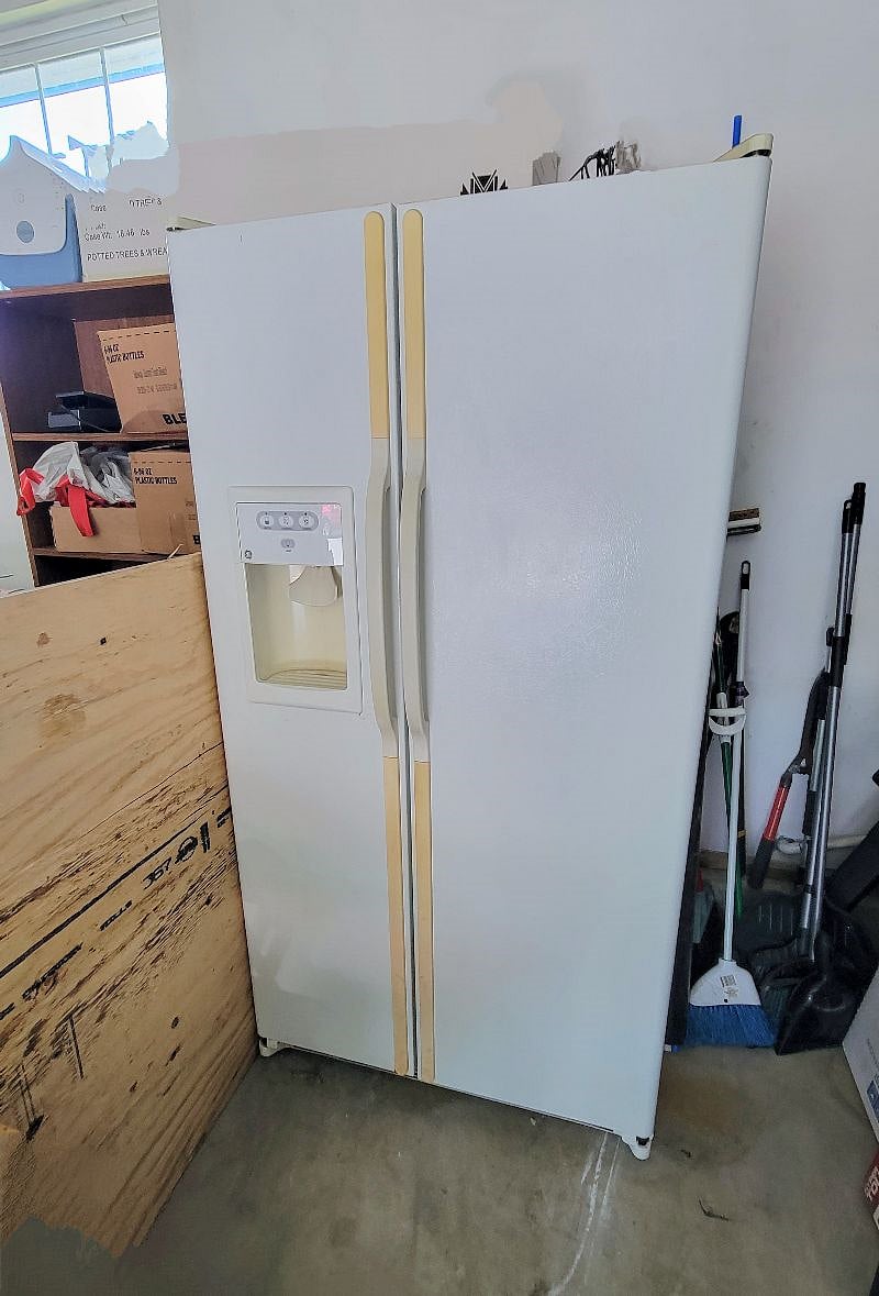 Full-size private fridge for you to use in the garage right by your room! (water dispenser not functional)