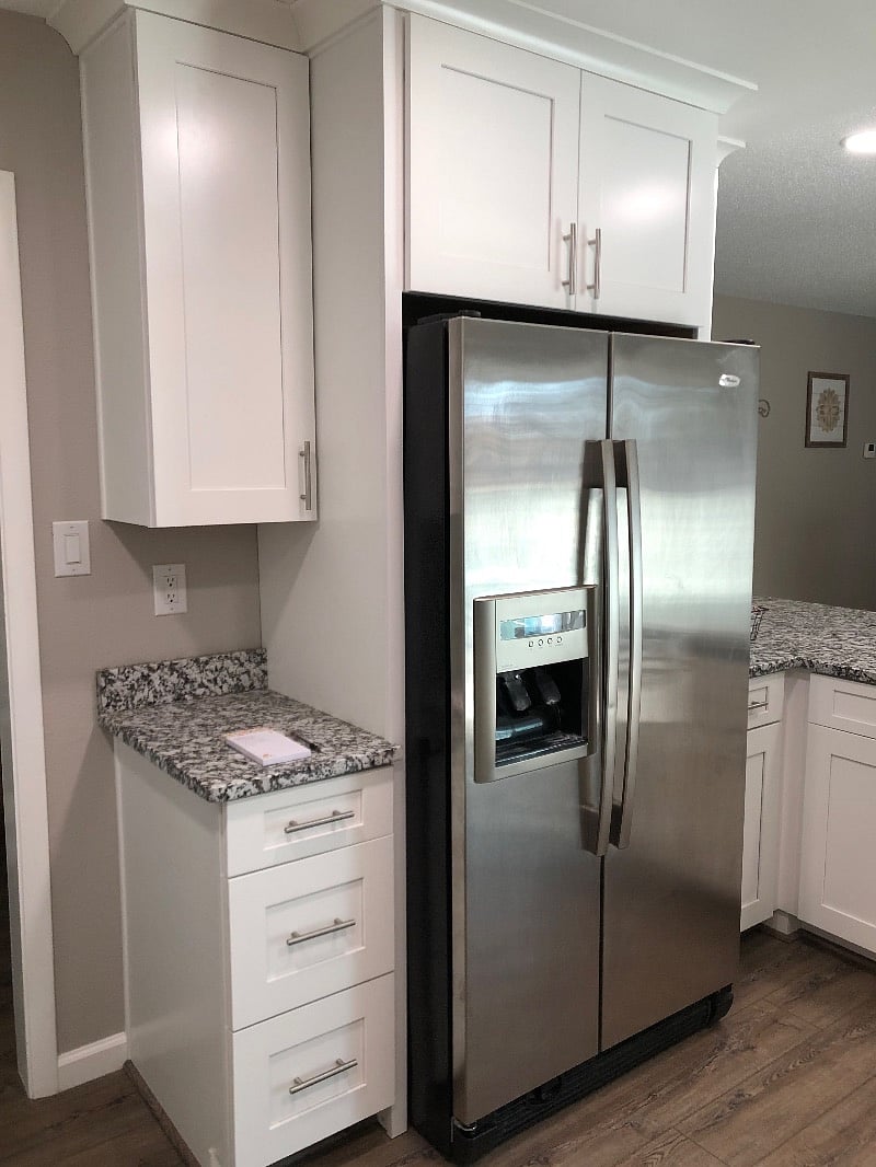 Double door refrigerator/freezer with in door ice and water