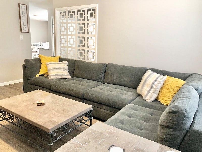 Living room with coffee table and sectional couch