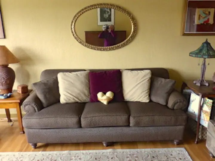 Living room couch (2 total), also with rocking chair and armchair.