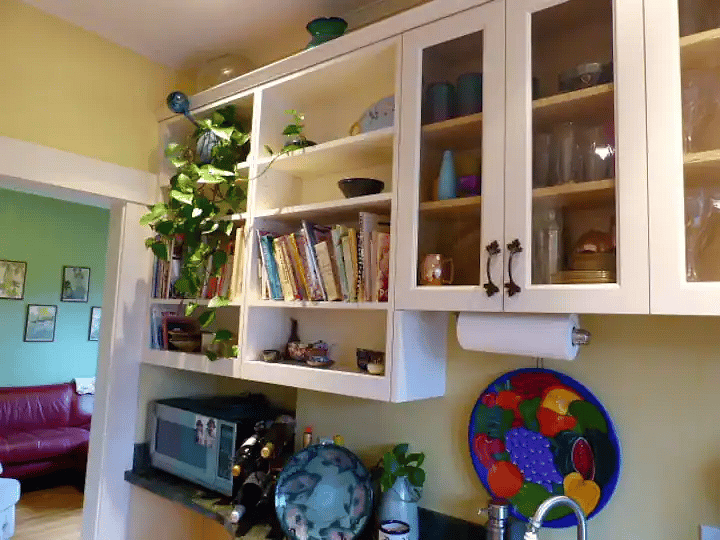 2nd Kitchen sink, china cabinet, and rows of cook books!