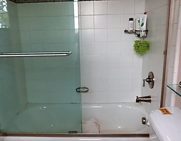 Bedroom 2 bathtub & shower--fully tiled.
