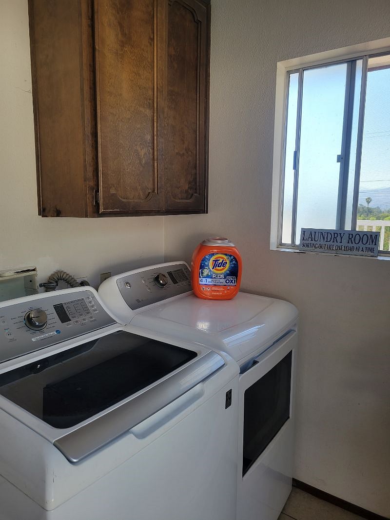 Shared laundry room with access from the pool area