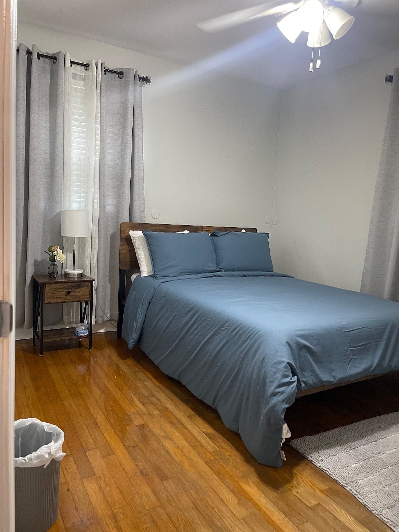The 2nd bedroom has a full size bed and room-darkening curtains. 