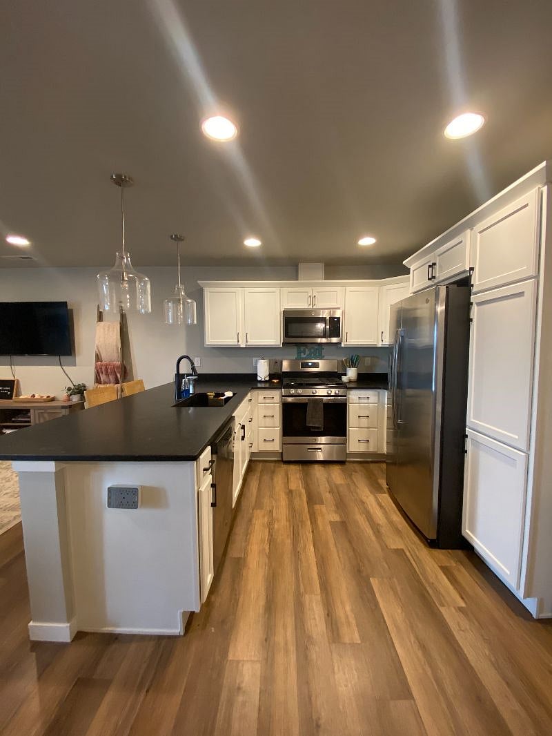 Full-sized kitchen with everything you might need during your stay! Including full-sized fridge, oven, and gas range.