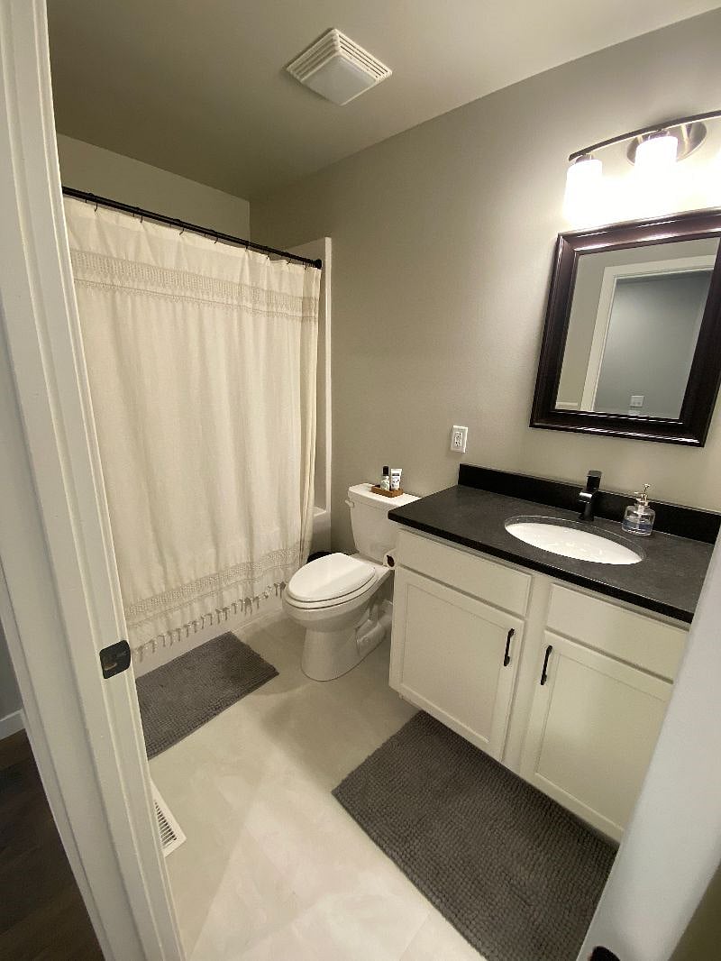 Guest bathroom large bathtub.