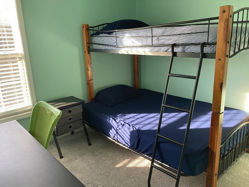 Green bedroom- full and single beds.