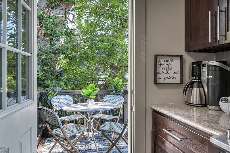 Just off of the kitchen you can access a small outside sitting area. 