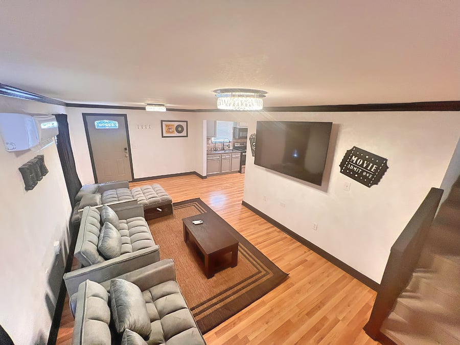 Living room area with 75 Tv