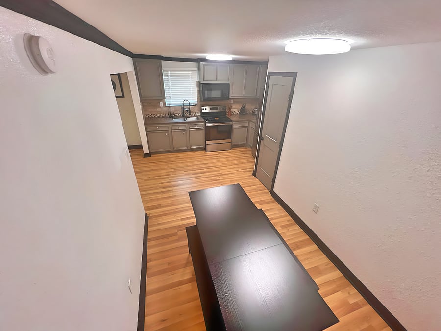 Kitchen/dining room. Table seats 8 and can be condensed if need be.