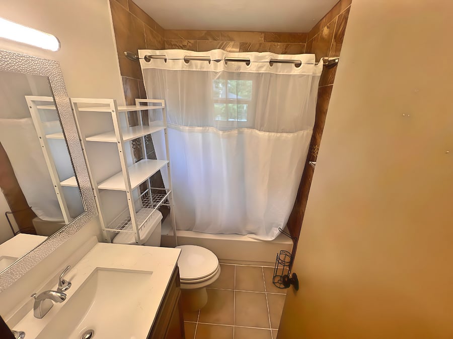 Upstairs restroom with a Garden tub.