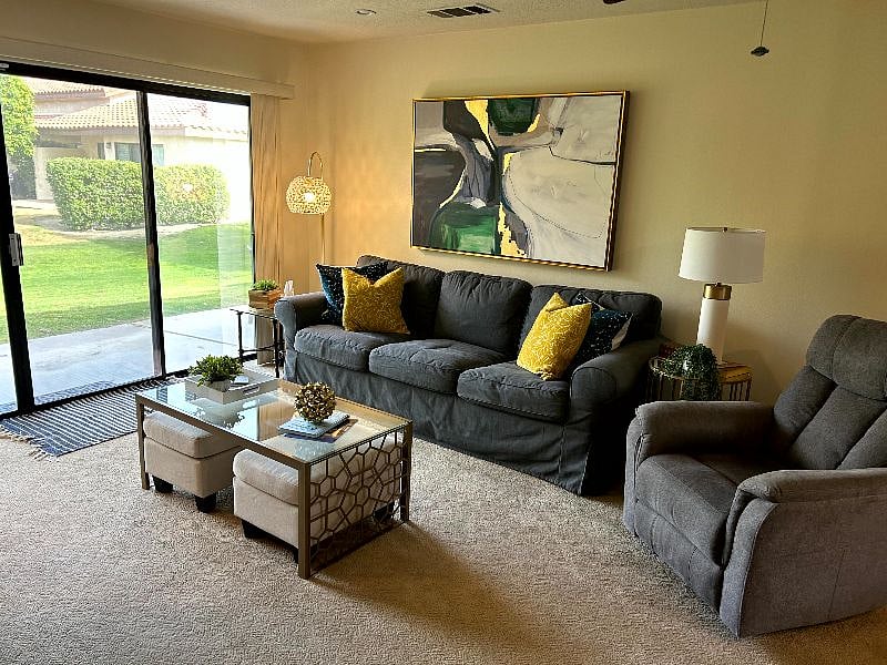 Spacious living area that looks on to the lake