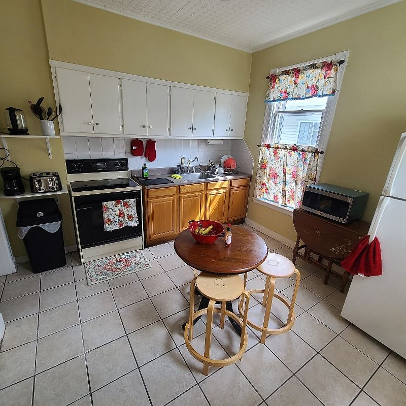 Well Stocked Kitchen with all appliances and utensils etc.