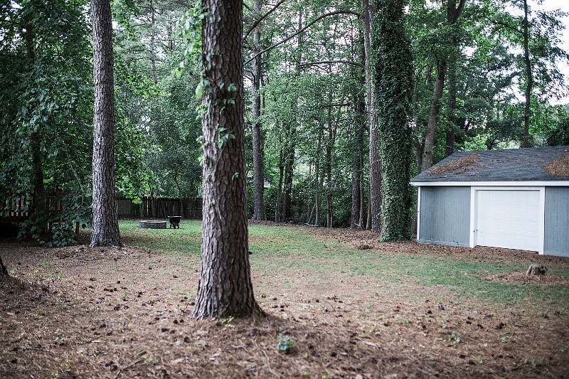 Large Back yard with Large additional storage area barn