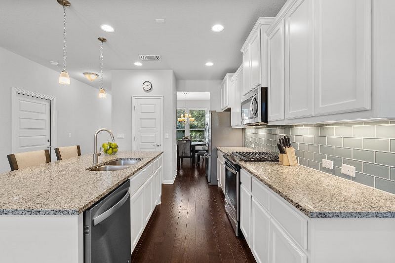 Fully Stocked Kitchen with Breakfast Bar