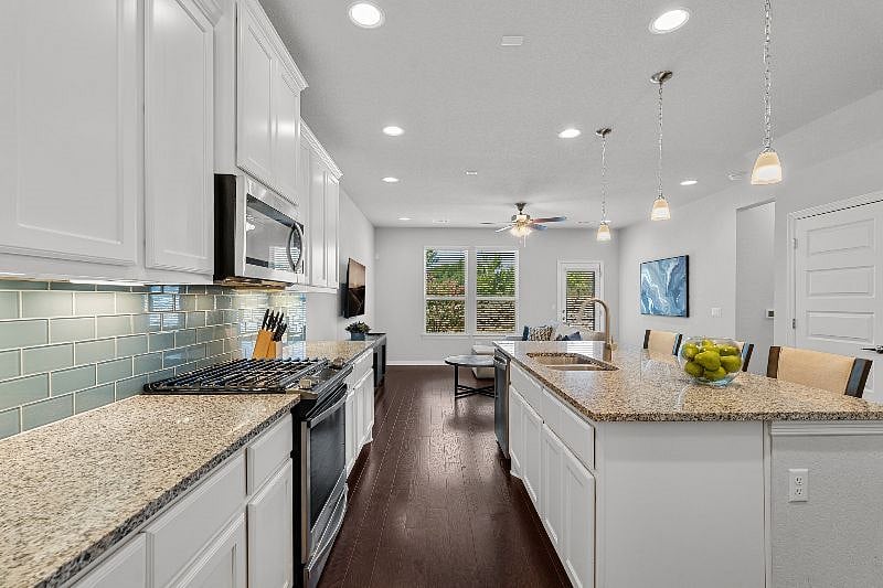 Fully Stocked Kitchen with Breakfast Bar