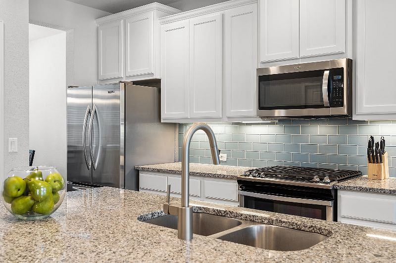 Fully Stocked Kitchen with Breakfast Bar